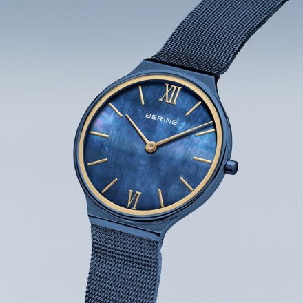 Zegarek Bering Ultra Slim 18434-397 granatowy ze złotymi detalami