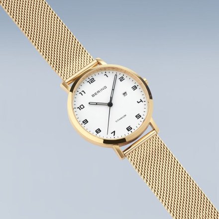 Bering Titanium złoty klasyczny zegarek damski 18634-334 z datownikiem