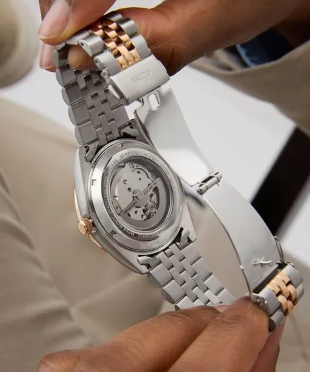 Guess Connoisseur zegarek automatyczny srebrno-różowozłoty z granatową tarczą GW0984G5