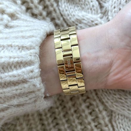 Złoty zegarek damski Guess Aurora z półsztywną bransoletką z brokatem W1288L2