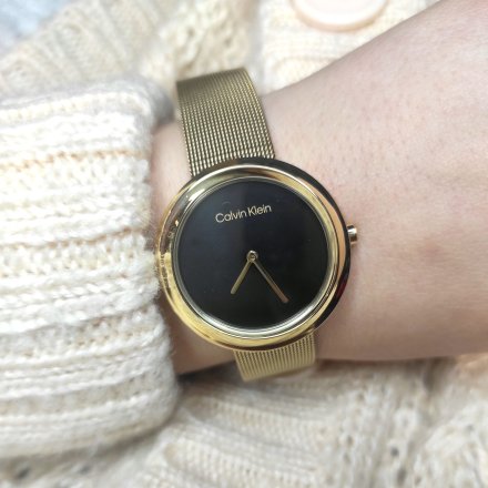 Zegarek damski Calvin Klein Twisted Bezel ze złotą bransoletką 25200012