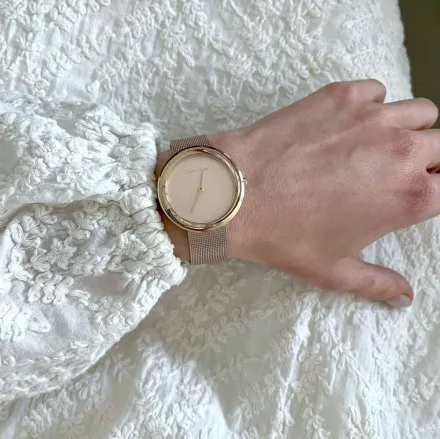 Zegarek damski Calvin Klein Twisted Bezel z różowozłotą bransoletką 25200013