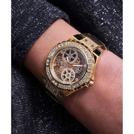 Złoty zegarek Guess Reveal z widocznym mechanizmem i bransoletką GW0302L2