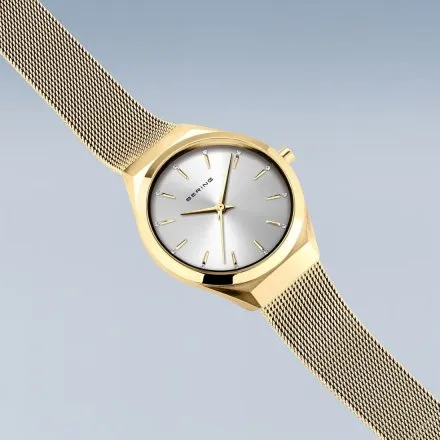 Złoty elegancki zegarek damski Bering Classic Sapphire 18729-330 z kryształkami